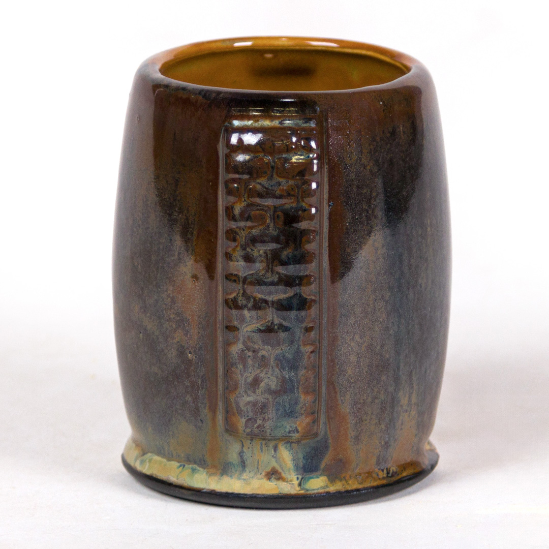 SW-112 Tiger’s Eye over SW-219 Opal Lustre on EG005 Black Engobe